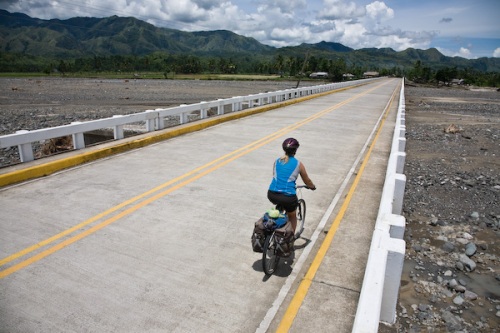 Probably my favourite cycling photo from the trip. Going places on a deserted highway... We crossed a lot of wide river beds and bridges like this. Judging by the size of the river beds and some of the damage we saw the rivers clearly flood the whole valleys during typhoons.